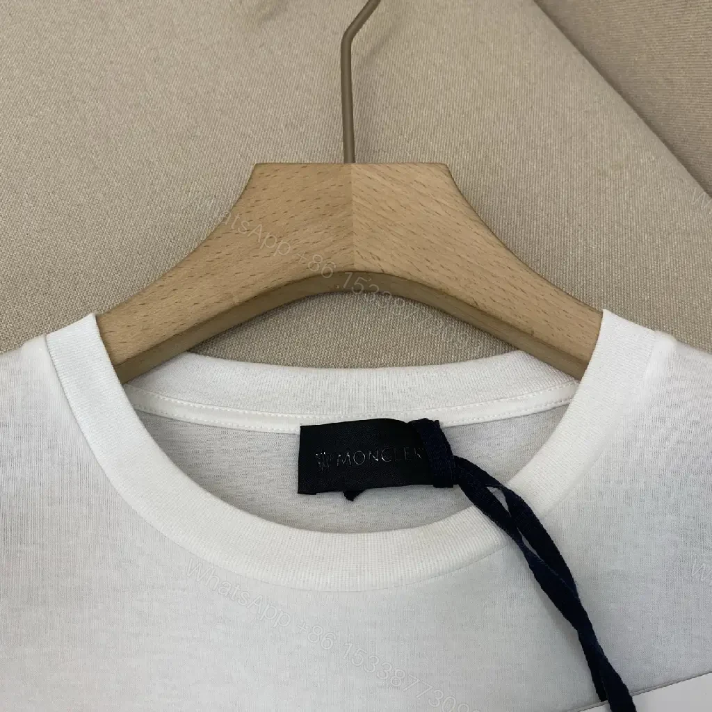 View 3 of Minimalist White Cotton Tee — Premium Logo Crewneck, Streetwear Style