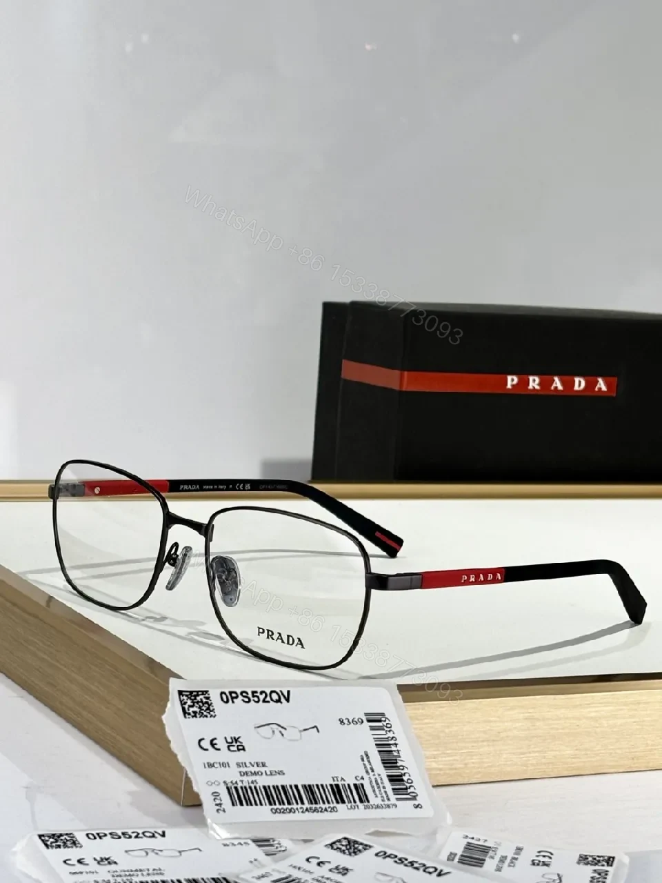 View 4 of Silver Metal Minimalist Precision Eyewear with Red Accents, Luxury Glasses