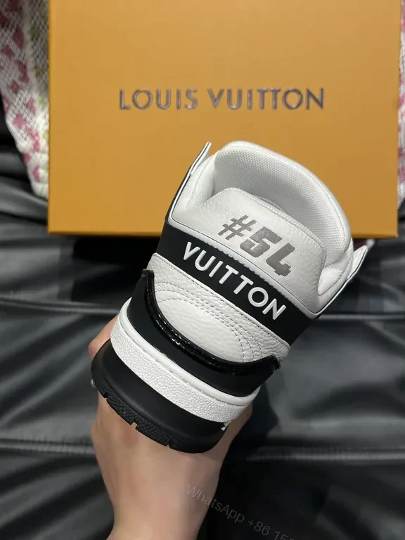 View 5 of White Leather High-Top Sneakers with LV Branding and Visible Hardware