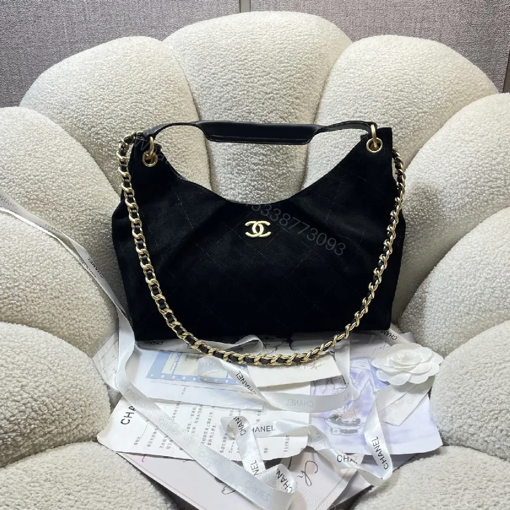 Quilted Black Bag with Gold Chain, Top Handle, Compact — view 1