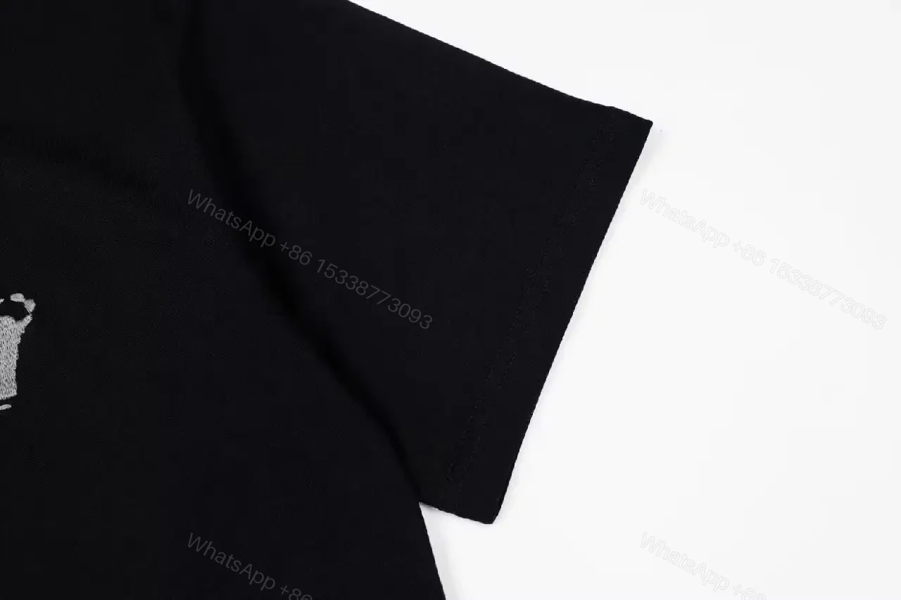 View 4 of Bold Black Cotton Tee, Textured Dior Logo, Modern Luxe