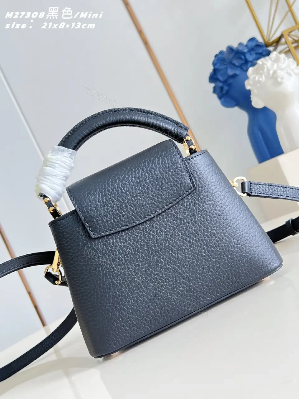 View 3 of Luxurious Mini Bag: Pebbled Leather, Layered Chains, Crossbody Embellishments