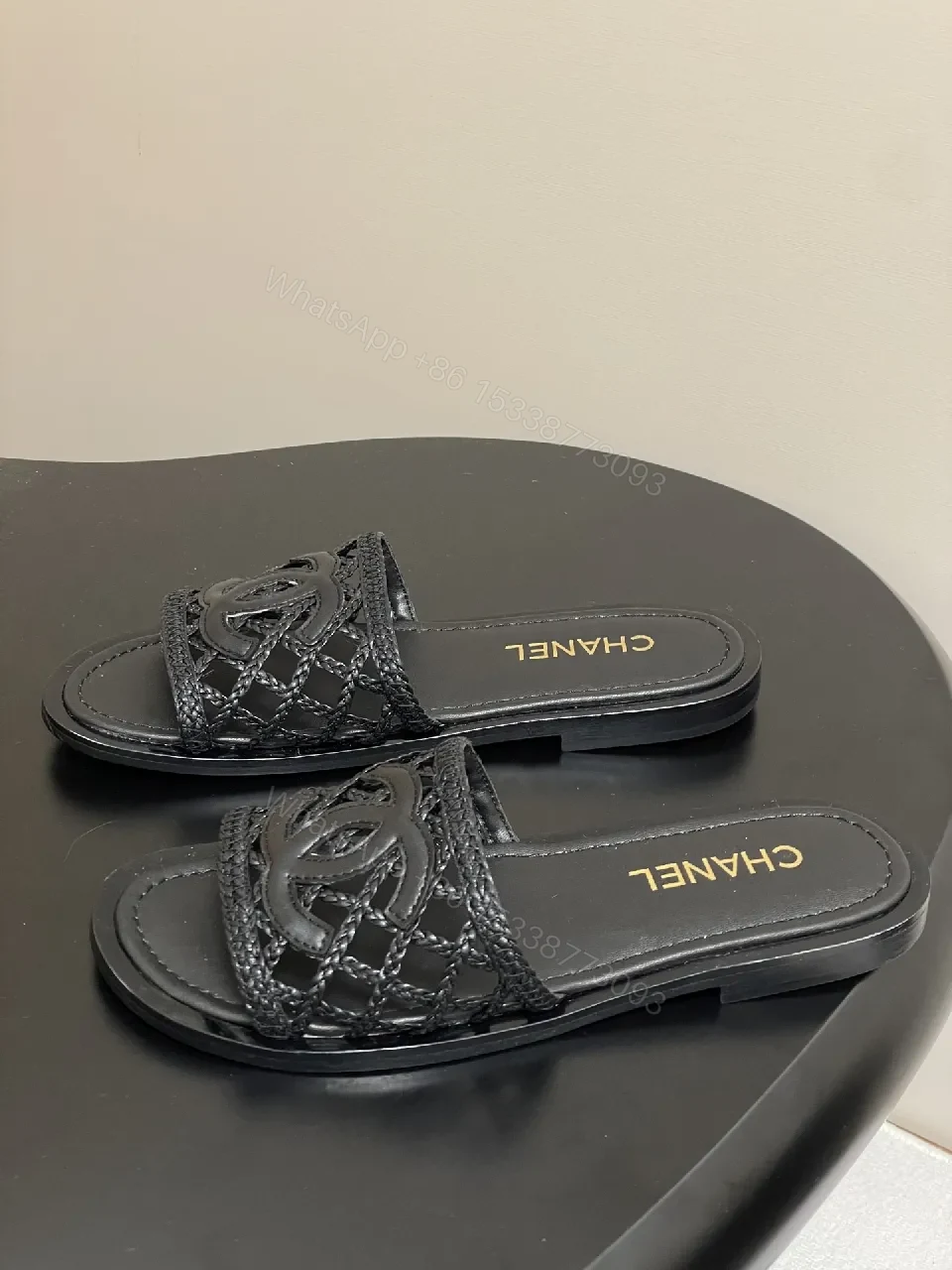 View 5 of Black Quilted Slide with Interlock Crest - Elevated Comfort Slipper