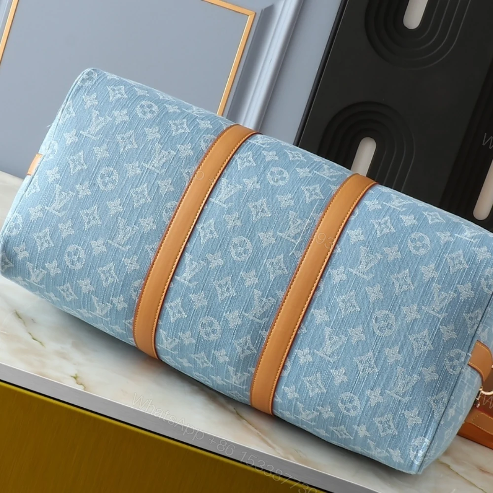 View 5 of Louis Vuitton Keepall Bandoulièrè 45 Bag Sky Blue Denim 45Cm M25334