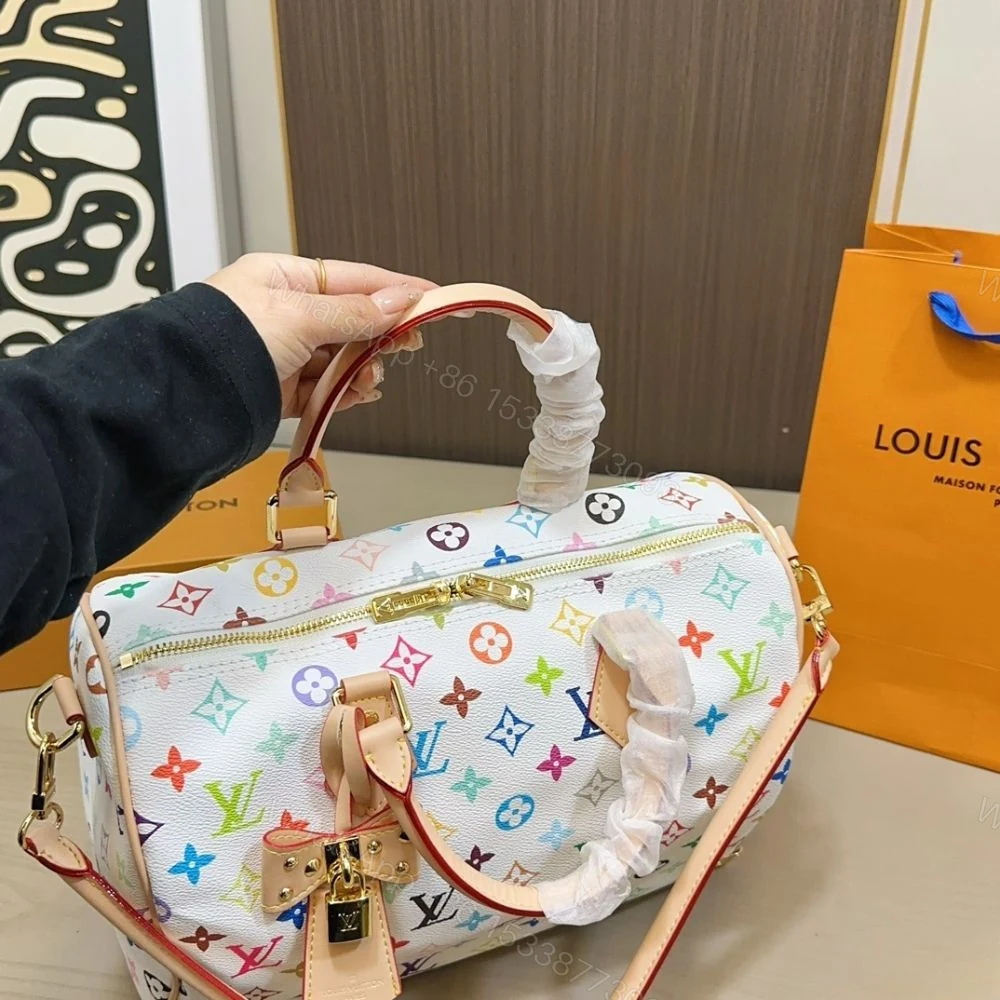 View 3 of Louis Vuitton TM Speedy Soft 30 Multicolor White 30Cm M27789