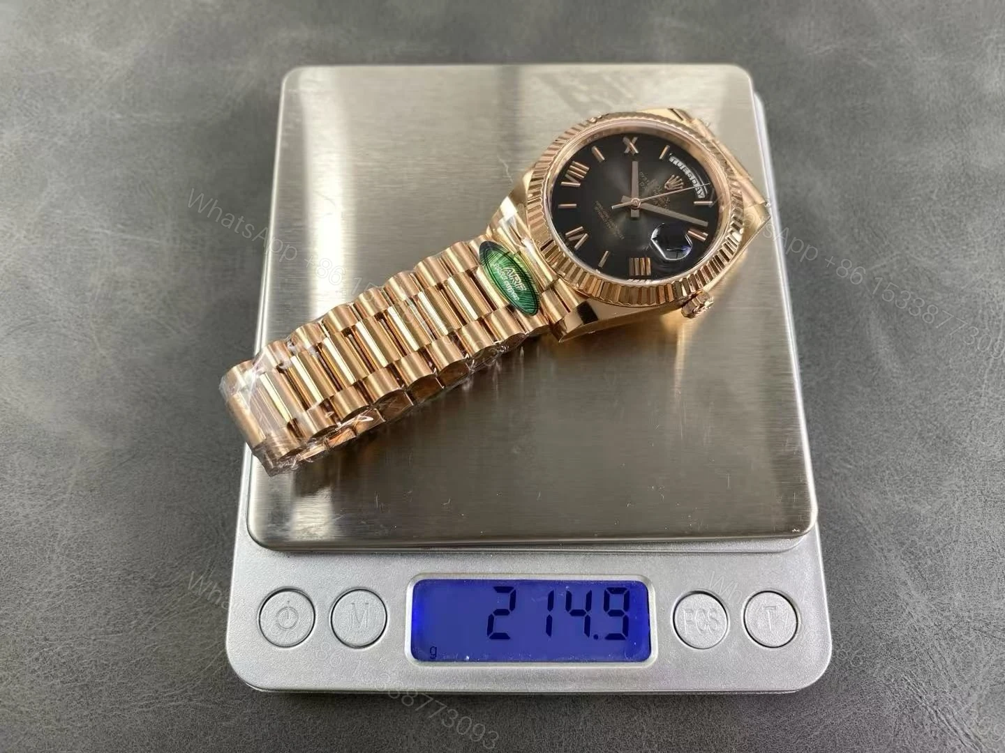 View 15 of Replica Rolex Day-Date 40 Black Smoke Dial