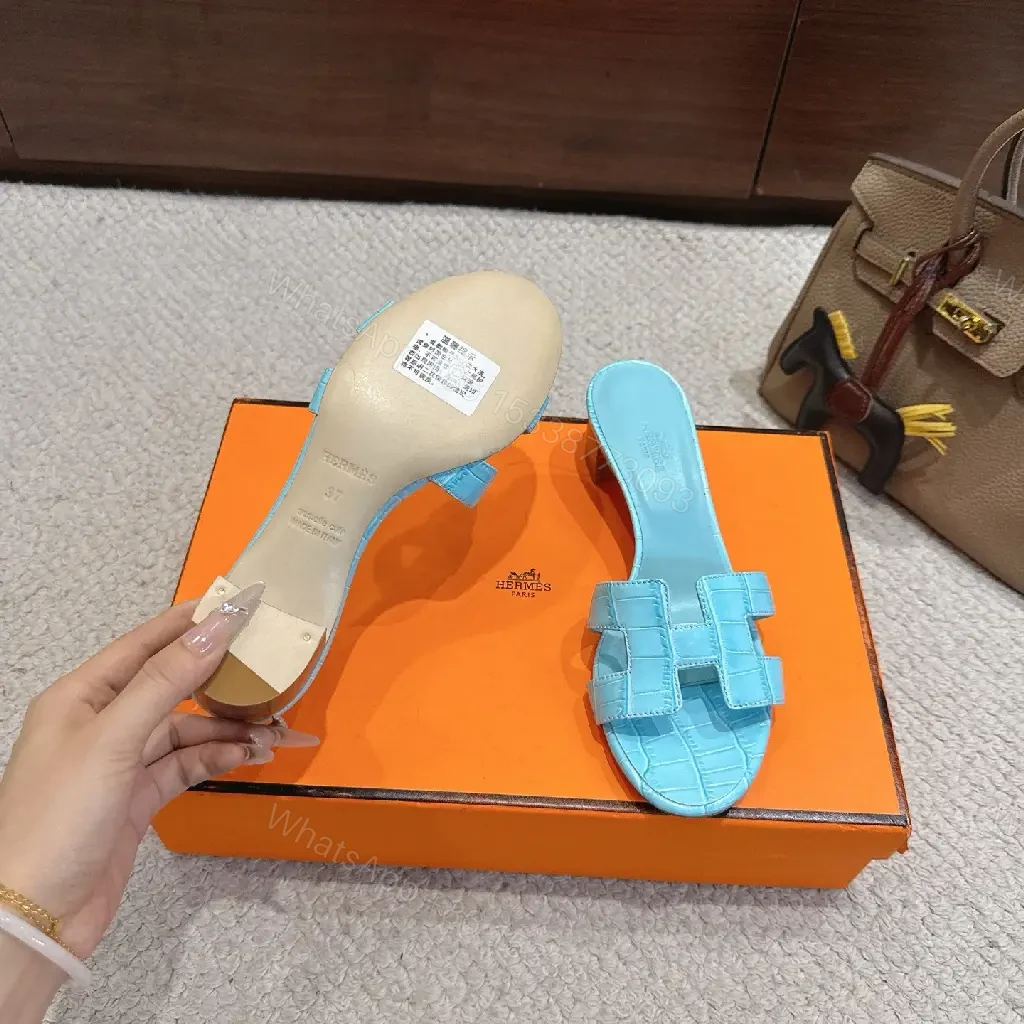 View 7 of Bright Sky Blue Leather Mules with Croc-Texture Strap - Luxury Comfort