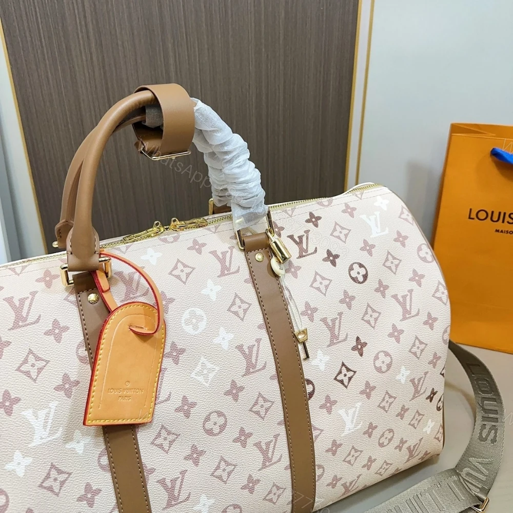 View 3 of Louis Vuitton Keepall Bandoulière 50 Monogram Beige 50Cm