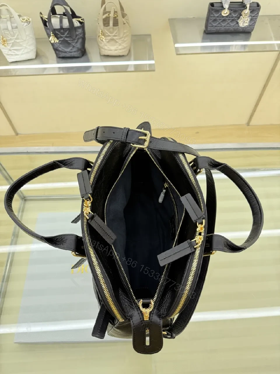 View 5 of Compact Luxury Satchel: Black Leather, Gold Hardware, Structured Style