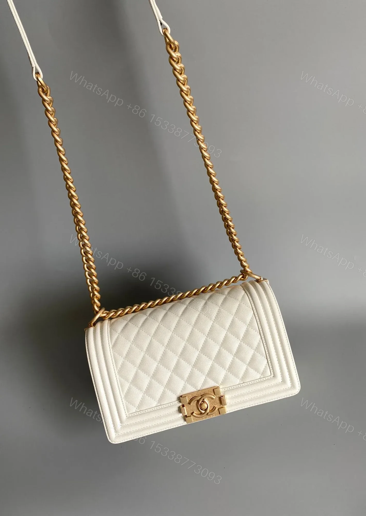 View 8 of CHANEL MEDIUM 25 BOY BAG IN WHITE LAMBSKIN GOLD HARDWARE