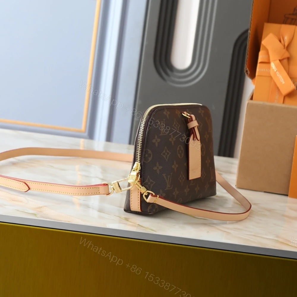 View 3 of Louis Vuitton Tag Me Pouch Monogram Brown 24Cm M26787