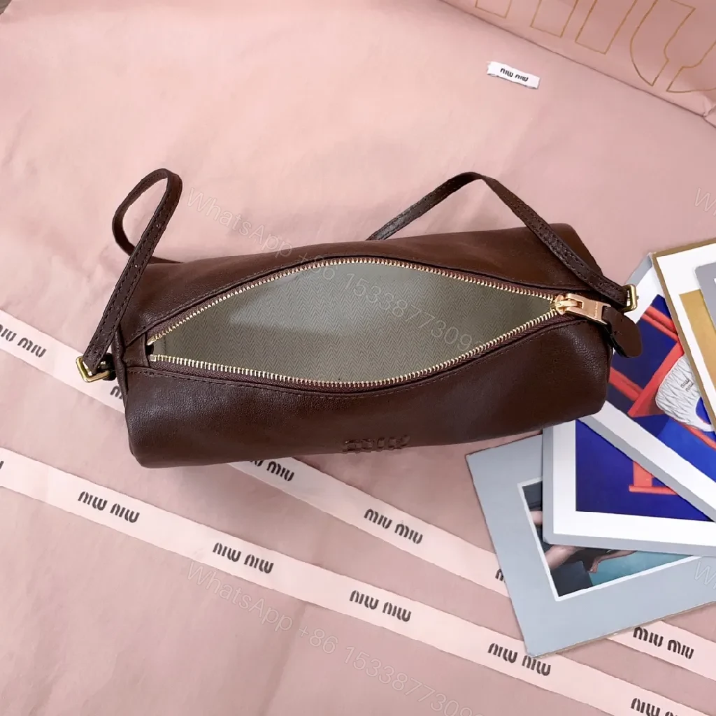 View 6 of Compact Luxury Leather Bag with Subtle Embossing