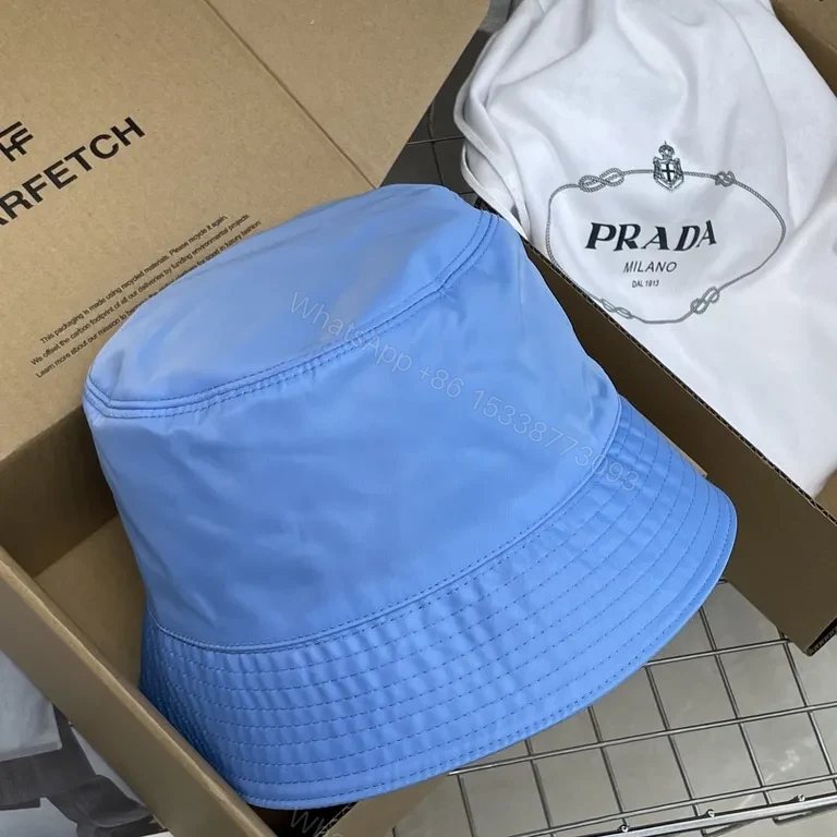 View 4 of Blue Prada Bucket Hat: Luxe Nylon, Sun-Protection, Packable