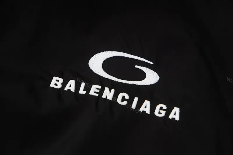 View 6 of Minimalist Black Windbreaker: Subtle Branding, All-Season Outerwear