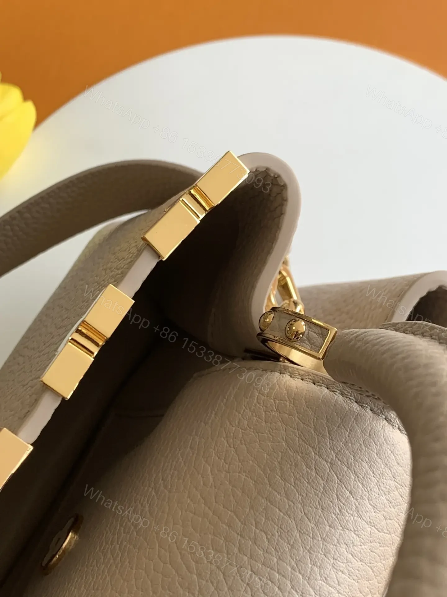 View 2 of Louis Vuitton Capucines handbag in a beige