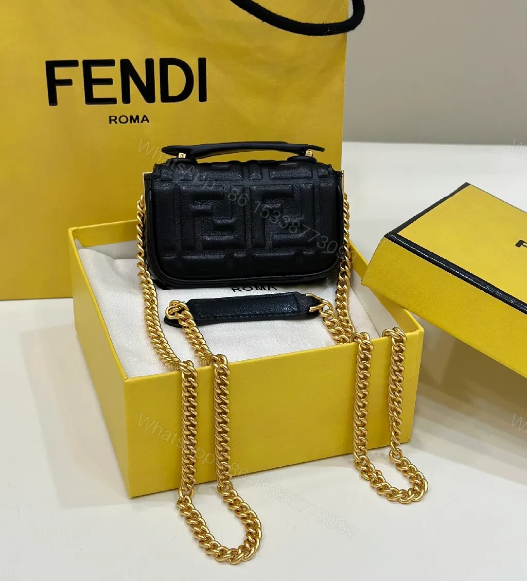 View 8 of Compact Leather Crossbody: Textured Luxury with Gold Chain Strap