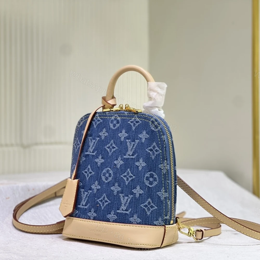 View 4 of Louis Vuitton Alma Backpack Blue Denim 20Cm