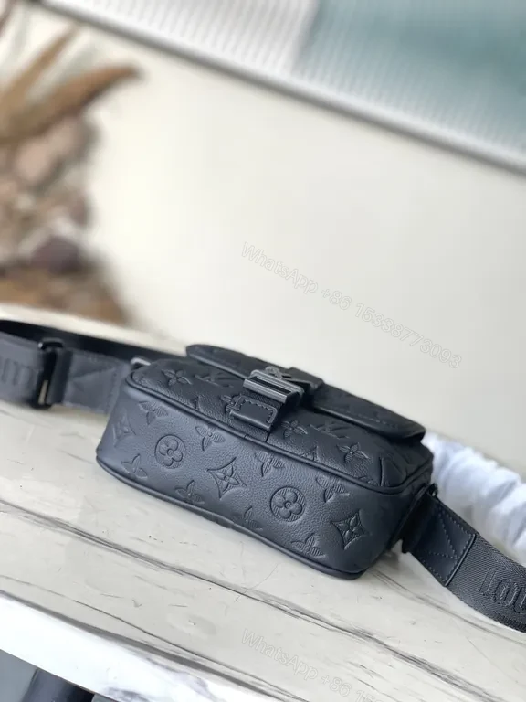 View 5 of Black Monogram Leather Messenger: Compact, Weather-Ready Luxury