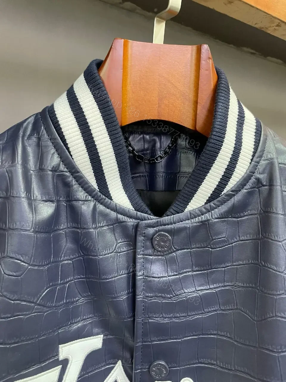 View 8 of Bold Navy Quilted Varsity Jacket with LV-Inspired Logo