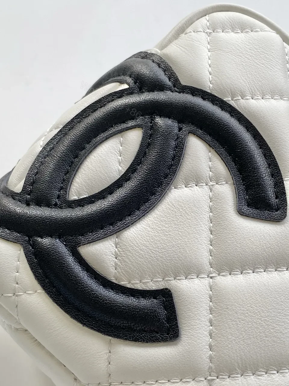 View 8 of Quilted Mini Bag with Signature Hardware - Dual-Tone Chic