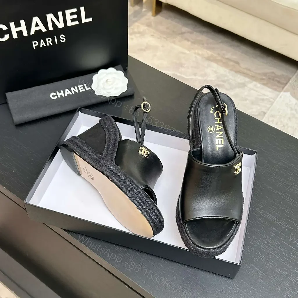View 4 of Chic Black Leather Wedge Sandals - Gold Emblem, Open Toe, Slingback