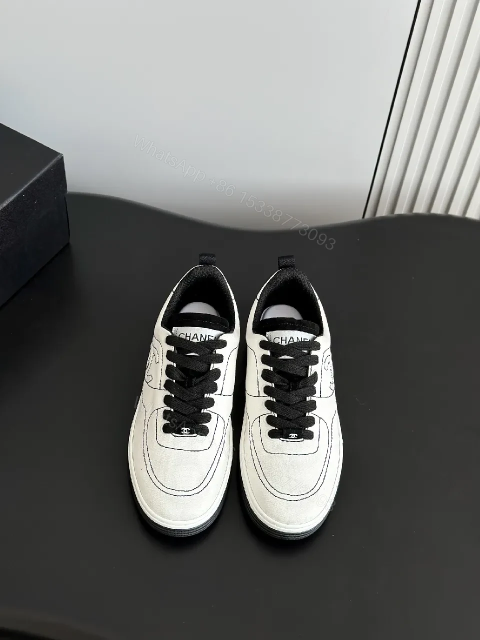 View 3 of Premium White Leather-like Low-Top Sneakers: Sleek, Comfortable, Versatile