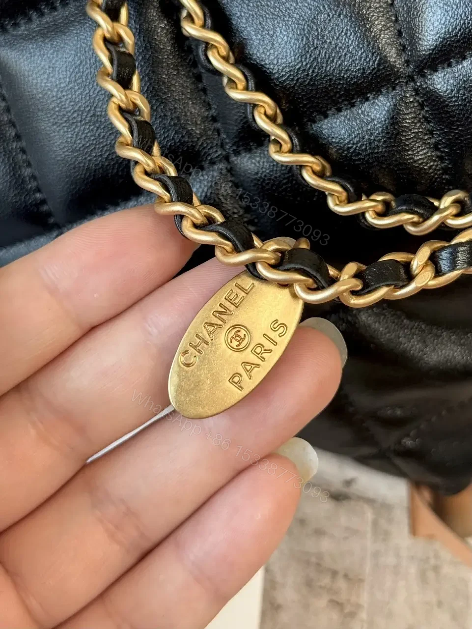 View 10 of Quilted Crossbody with Gold Emblem: Compact Luxury Bag