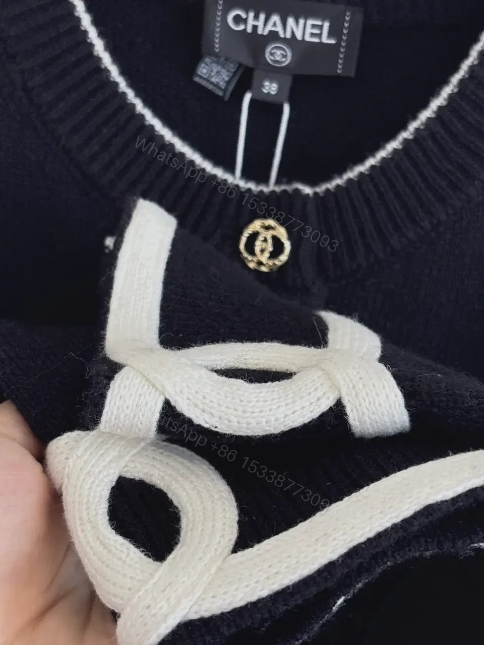 View 3 of Black Knit Jacket with White Piping & Gold Hardware
