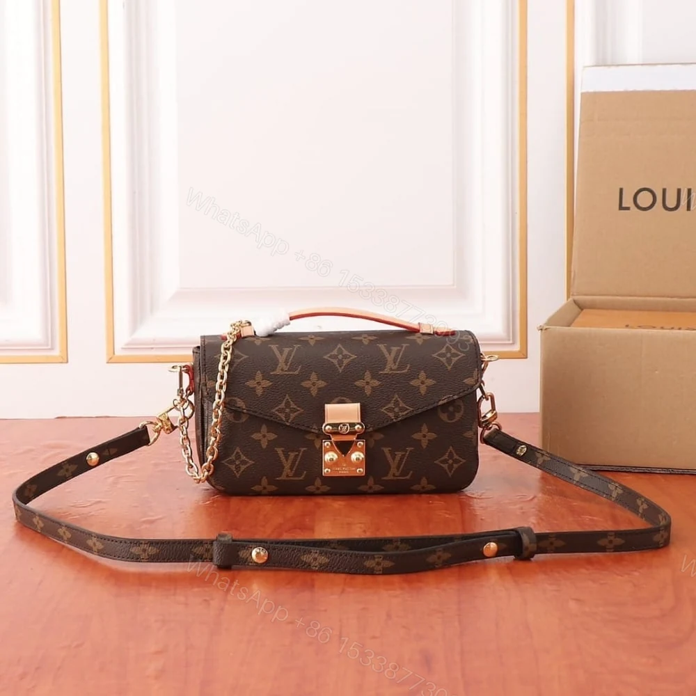 View 2 of Louis Vuitton Pochette Métis East West Bag Monogram Brown 22Cm M46279