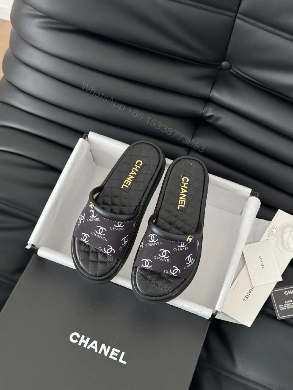 Black quilted slide sandals, faux leather, luxe casual, cushioned footbed, slide sandal — view 1