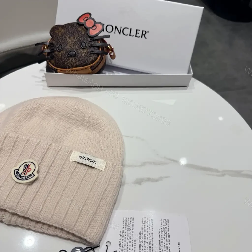 View 5 of Beige Wool Knit Beanie, Subtle Crest, Everyday Luxury