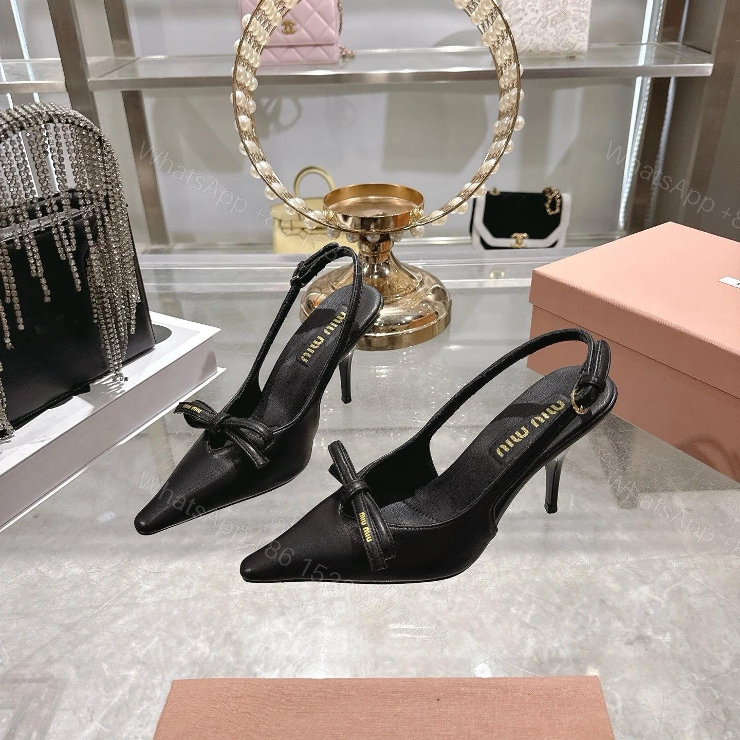 View 4 of Miu Miu Slingback Pumps With Bow Black