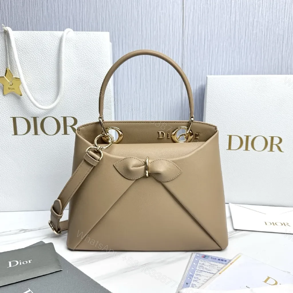 Geometric Leather Mini Bag: Chic Bow Accent, Gold Hardware — view 1