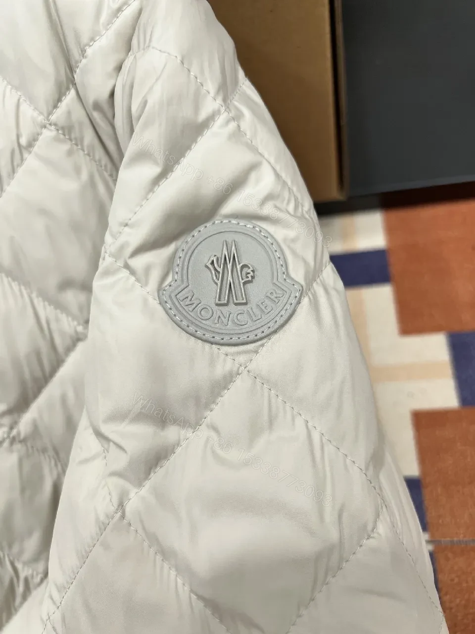 View 7 of Quilted Light Warmth Jacket — Diamond Stitch, Minimal Sleek Style