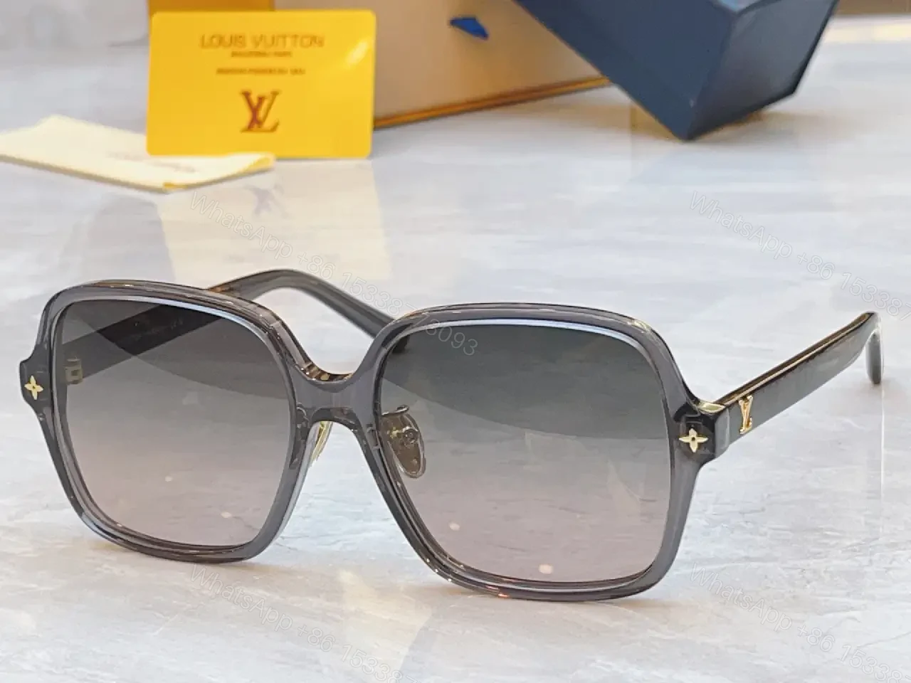 View 8 of Gray Glossy Square Sunglasses Gradient Lenses, Metal Accents, Luxury Style, Louis Vuitton Temples (No Brand Details)