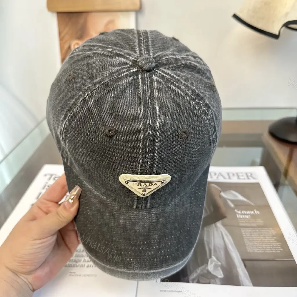 View 6 of Washed Dark Gray Denim Cap, Curved Brim, Distressed Texture, Prada Patch