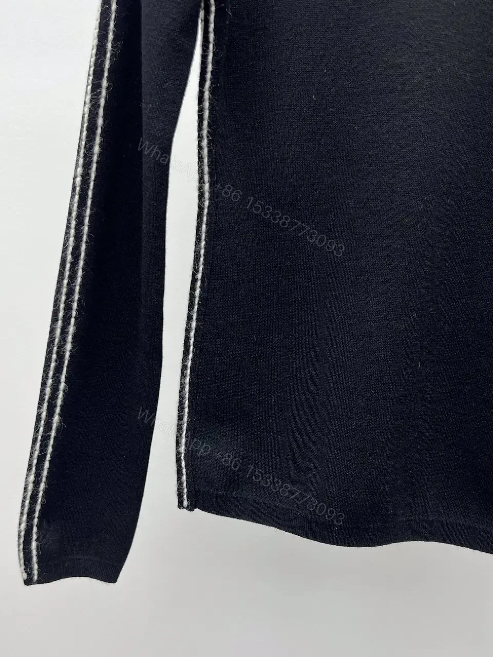 View 2 of Elegant Knit Turtleneck with Signature Embroidery, Black Knit Dishive