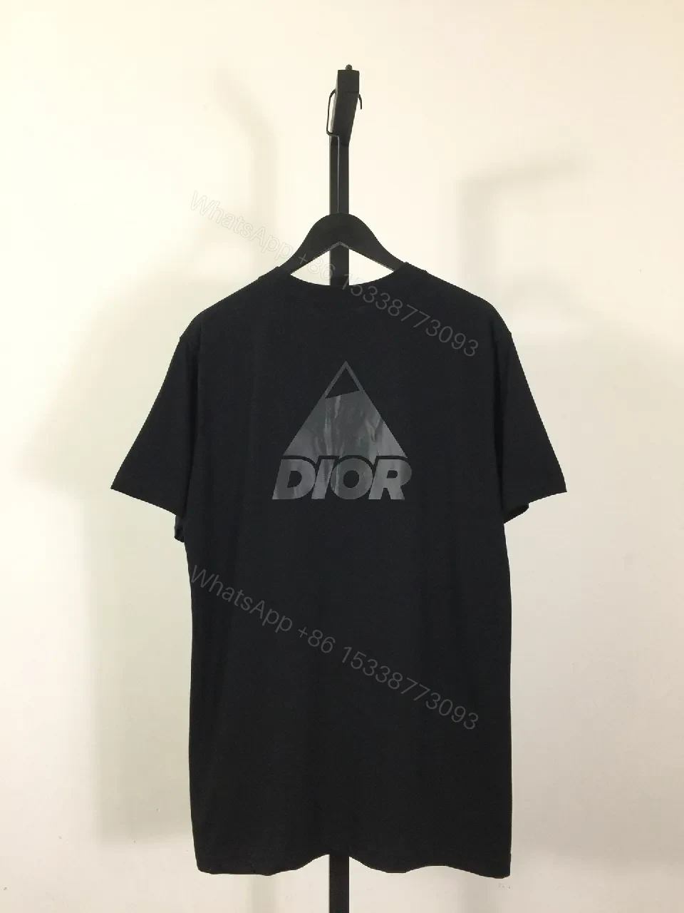 View 3 of Minimalist Black Tee Dress: Subtle Dior Branding, Versatile Style