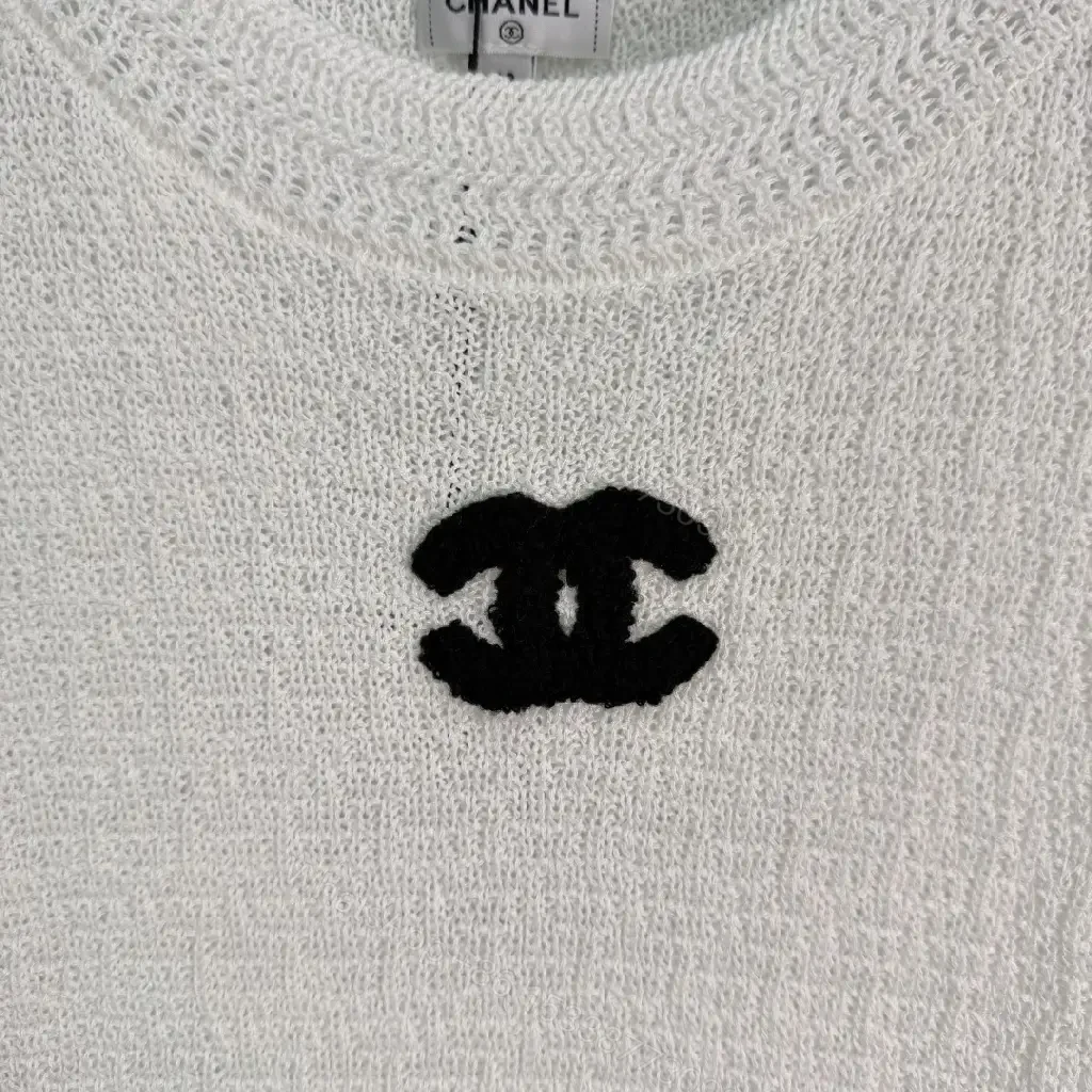 View 7 of White boucle knit relaxed-fit sweater with Chanel logo