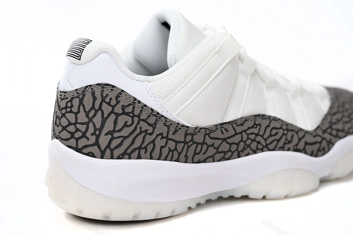View 8 of Air Jordan 11 Retro Low “Cement Grey” AV2187-140