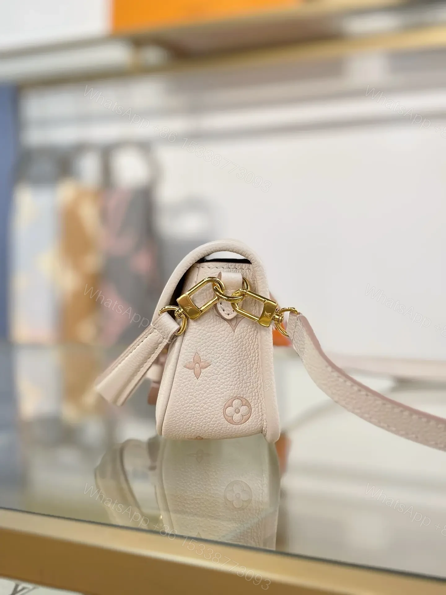 View 5 of Louis Vuitton Nano Diane bag in cream Monogram Empreinte