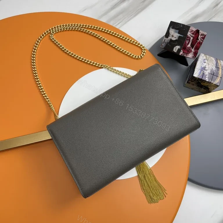 View 3 of Compact Luxury Crossbody: Soft Grain Leather, Gold YSL Logo Tassel