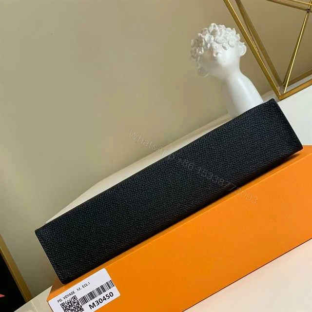 View 3 of LOUIS VUITTON POCHETTE VOYAGE TAIGA LEATHER M30450