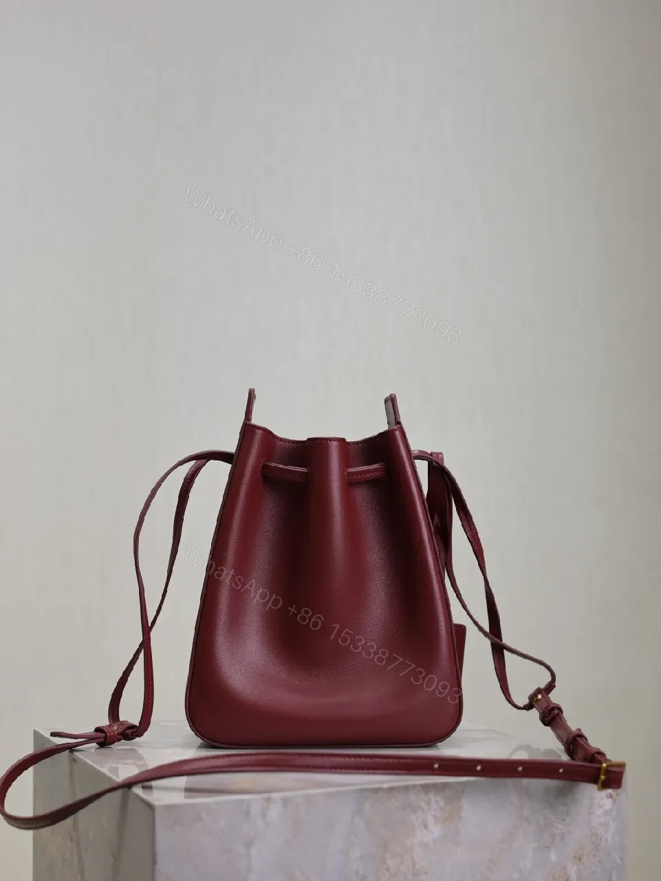 View 2 of Deep Bordeaux Leather Drawstring Bucket Bag—Elevated Everyday Style
