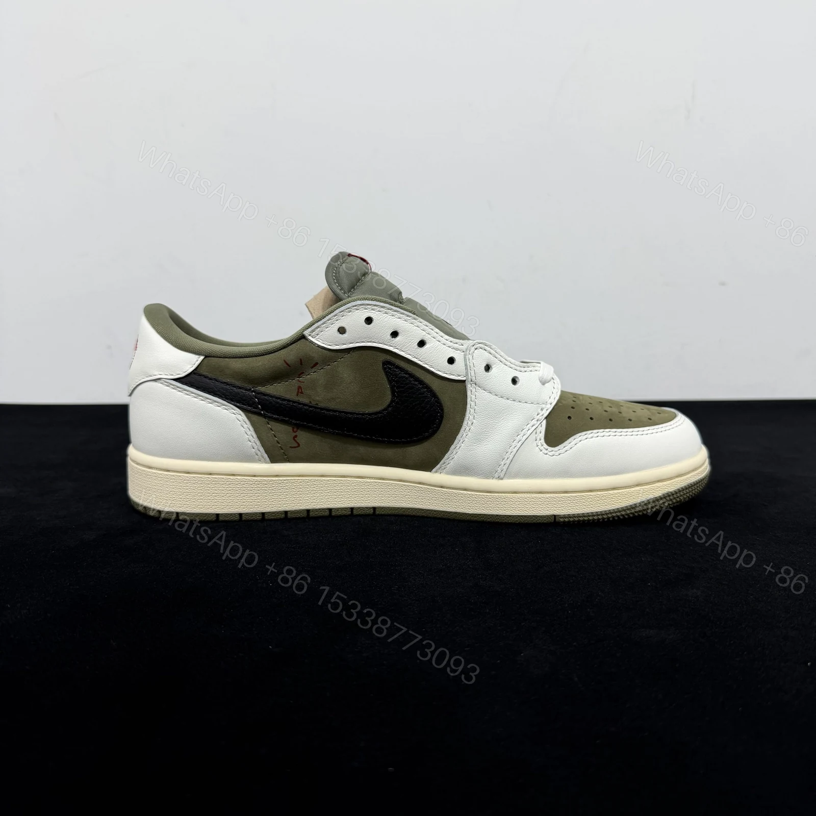View 2 of Travis Scott x Air Jordan 1 Low Medium Olive Reps
