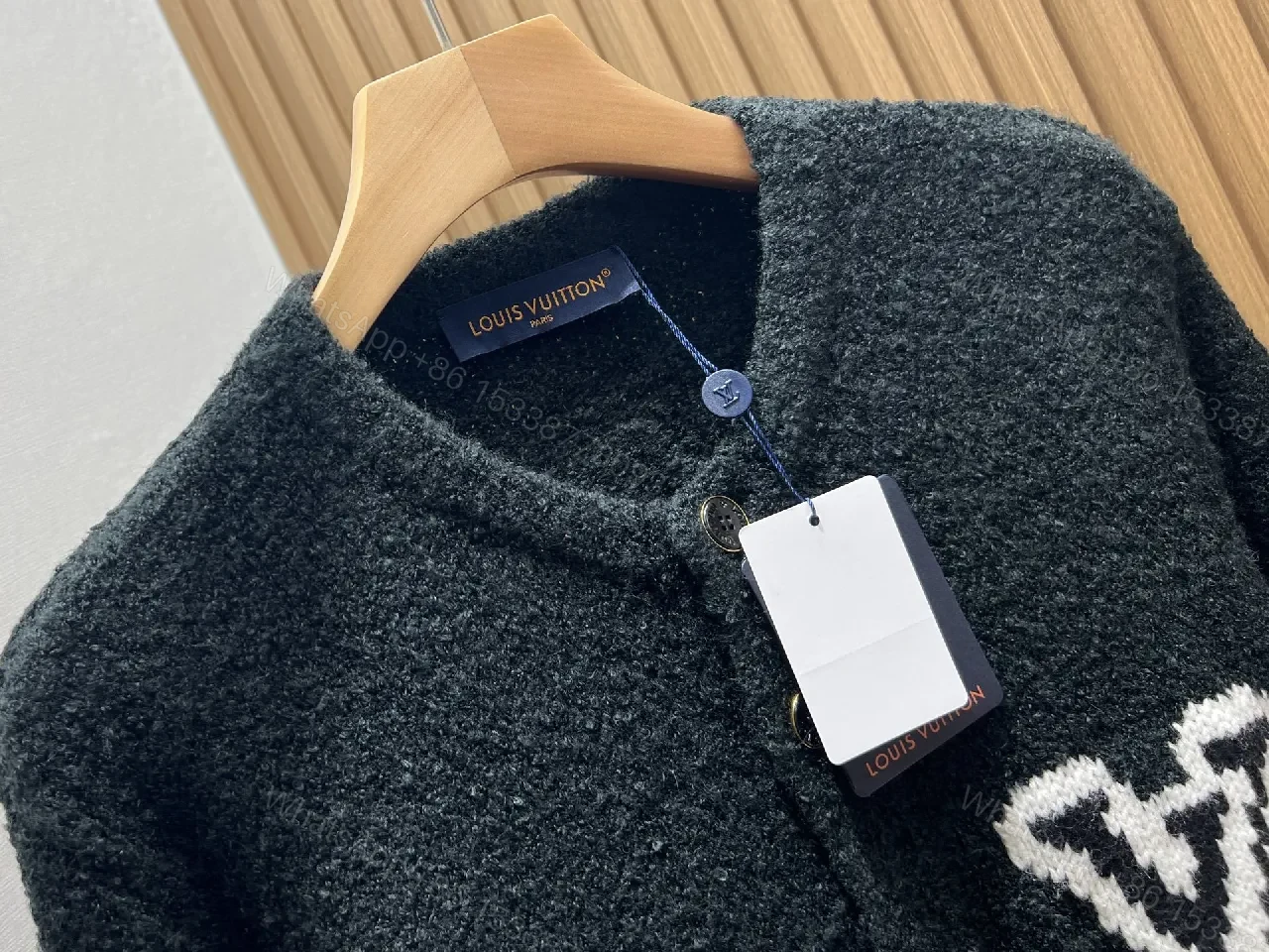 View 8 of Black Boucle Cardigan | Luxe Texture + Signature Logo + Cozy Warmth