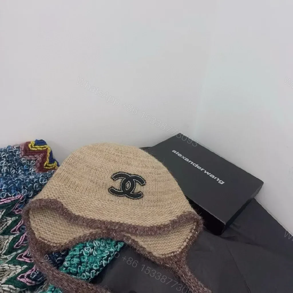 View 3 of Chic Knit Beanie with Logo Detail: Cozy Luxury Everyday