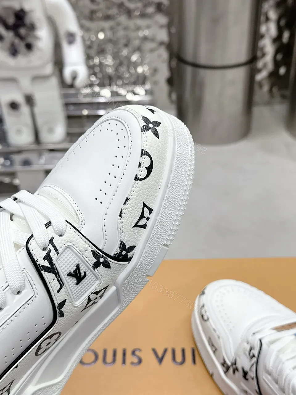 View 4 of White Leather Sneaker, Monogram Motif, Luxe Street Style, Designer Flair, Sneaker