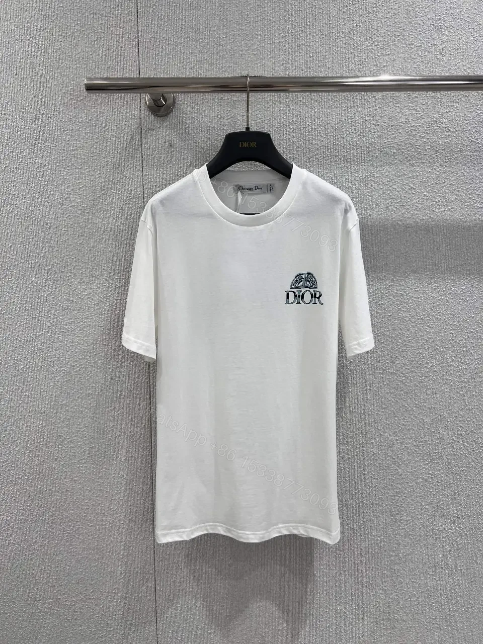 Minimalist White Cotton Tee with Crest – Everyday Luxe T‐Shirt — view 1