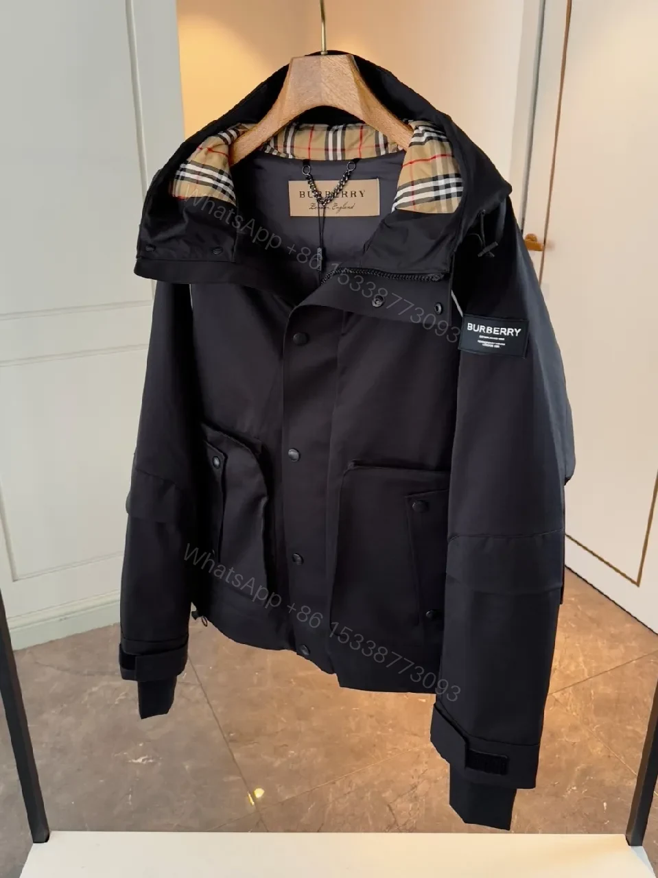 View 4 of Water-Resistant Black Parka with Plaid Lining Luxury-Utility Coat